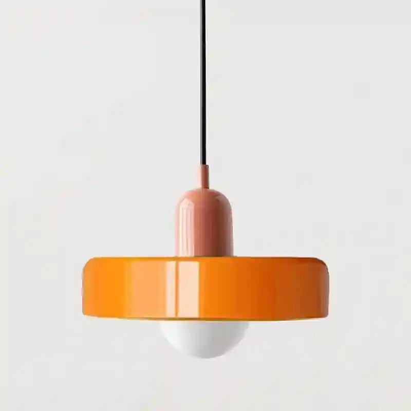 Orange wooden pendant light with round shade and white LED bulb suspended by black cord.