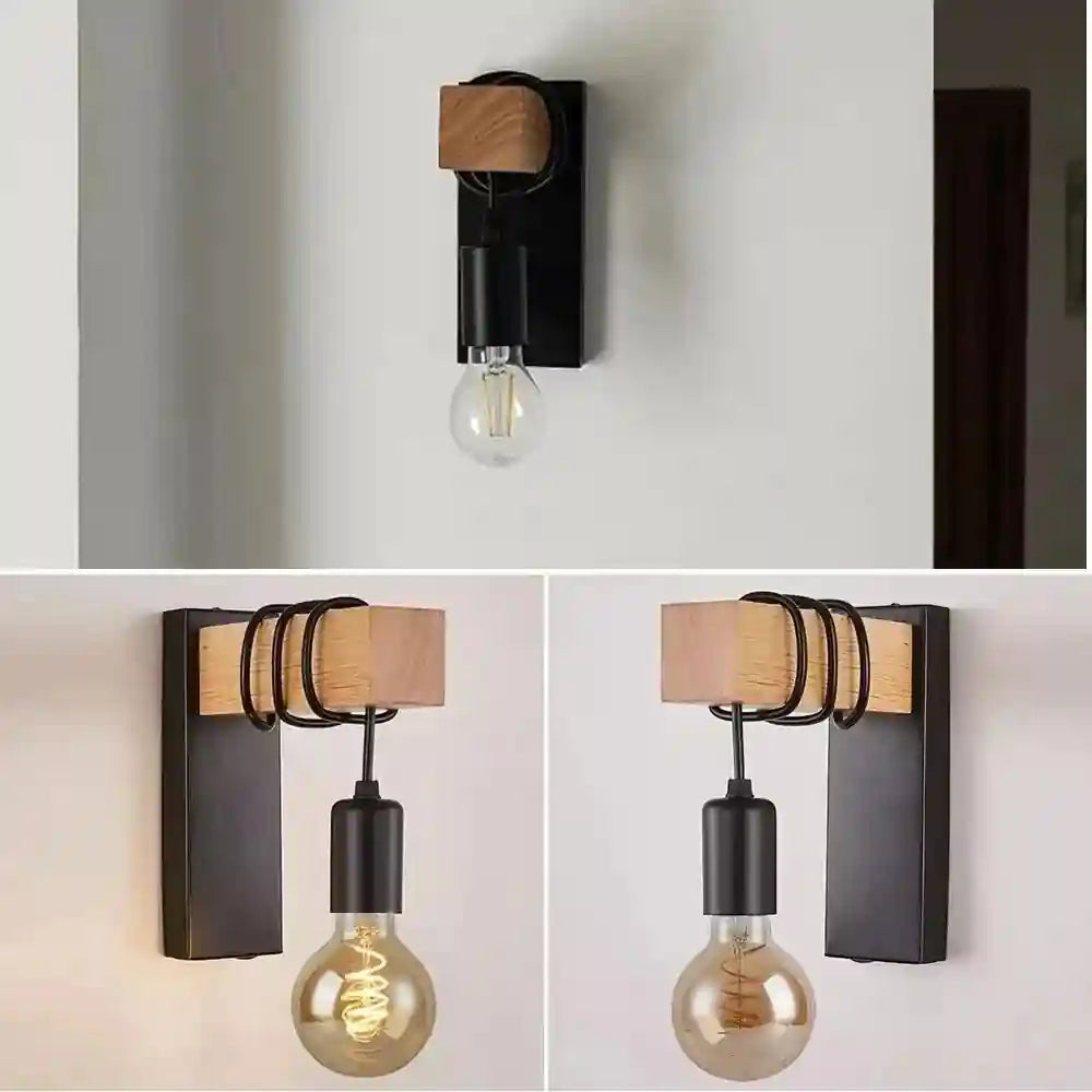 Black industrial wall lamp with wooden accent and exposed LED bulb.