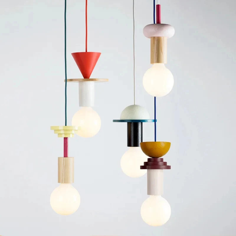 Modern Nordic wooden pendant lights with colorful geometric shapes and warm LED bulbs.