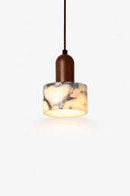 Modern pendant light with marble-effect cylindrical shade and wooden top, warm LED glow.